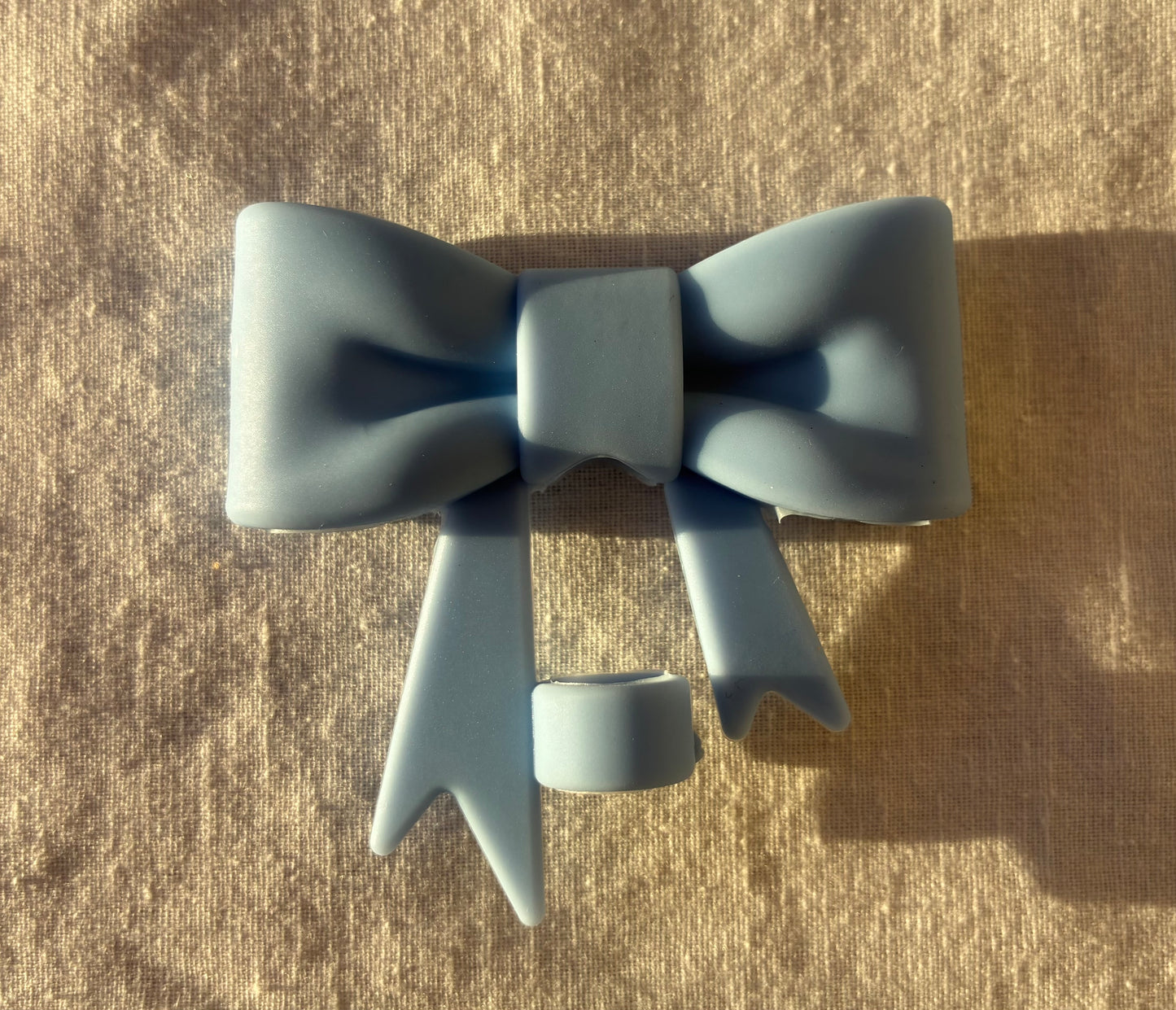 Blue bow straw topper