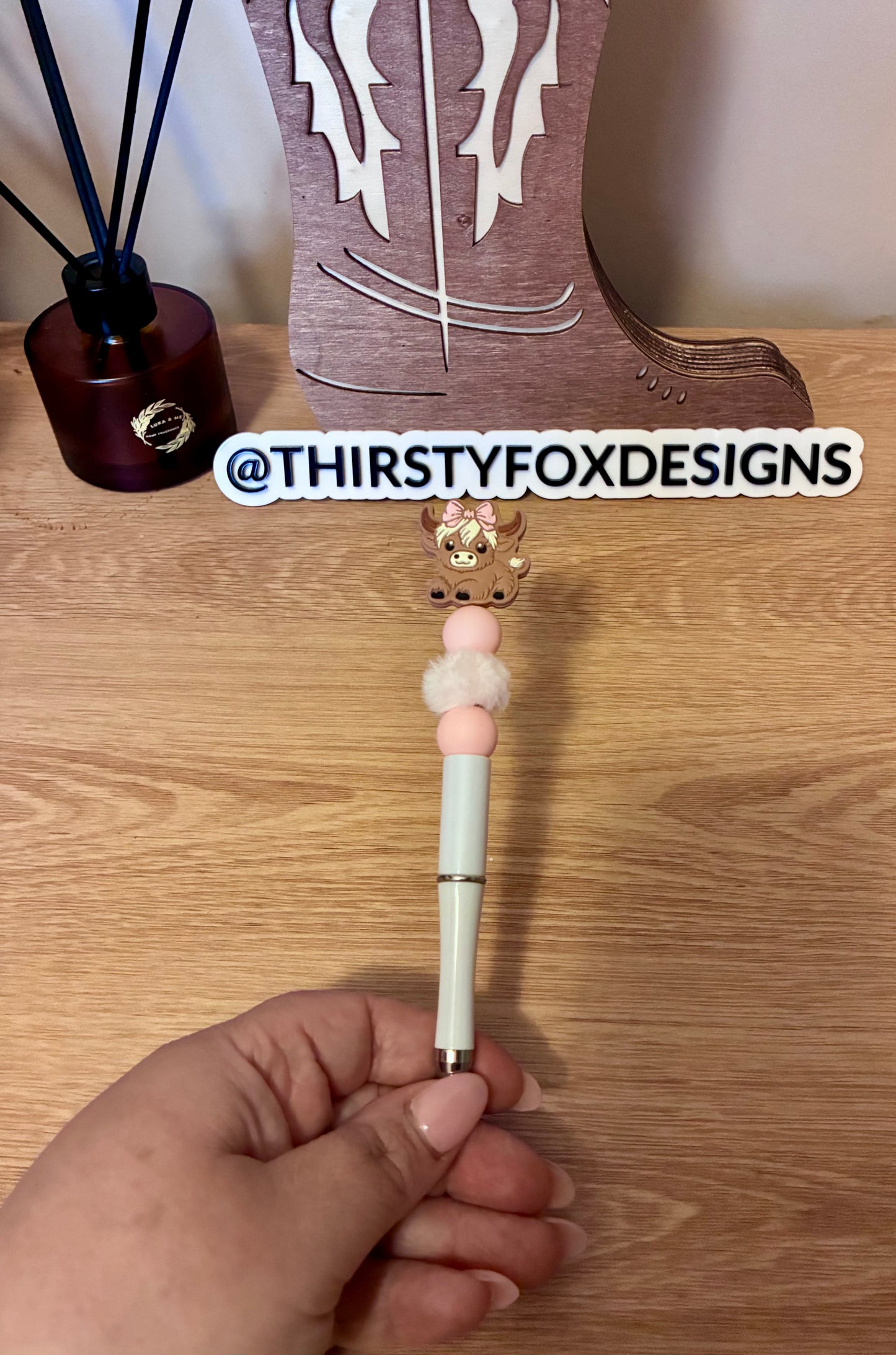 Pink & white beaded cow pen