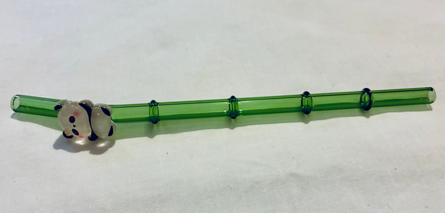Glass panda on bamboo straw