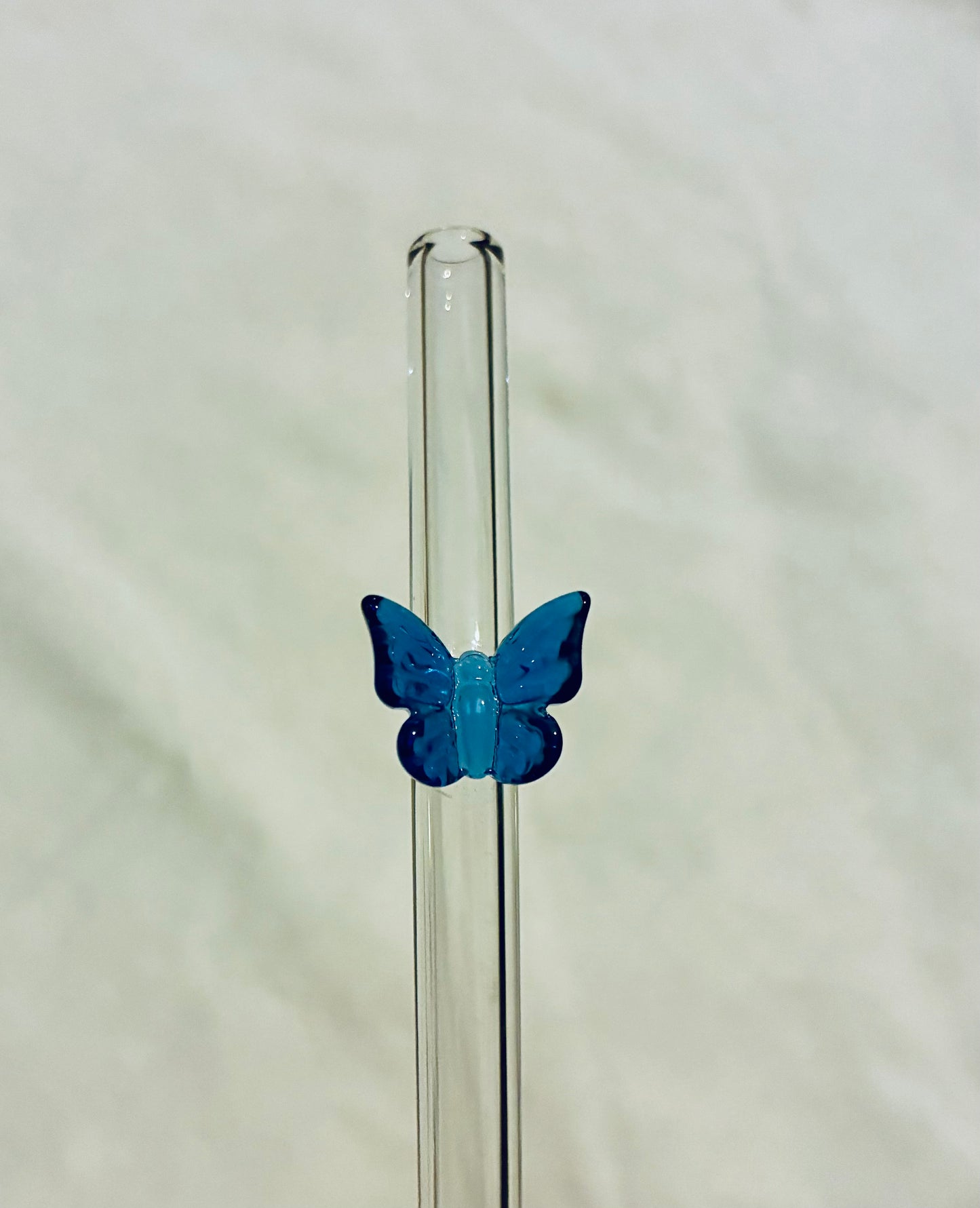 Dark blue glass butyerfly straw
