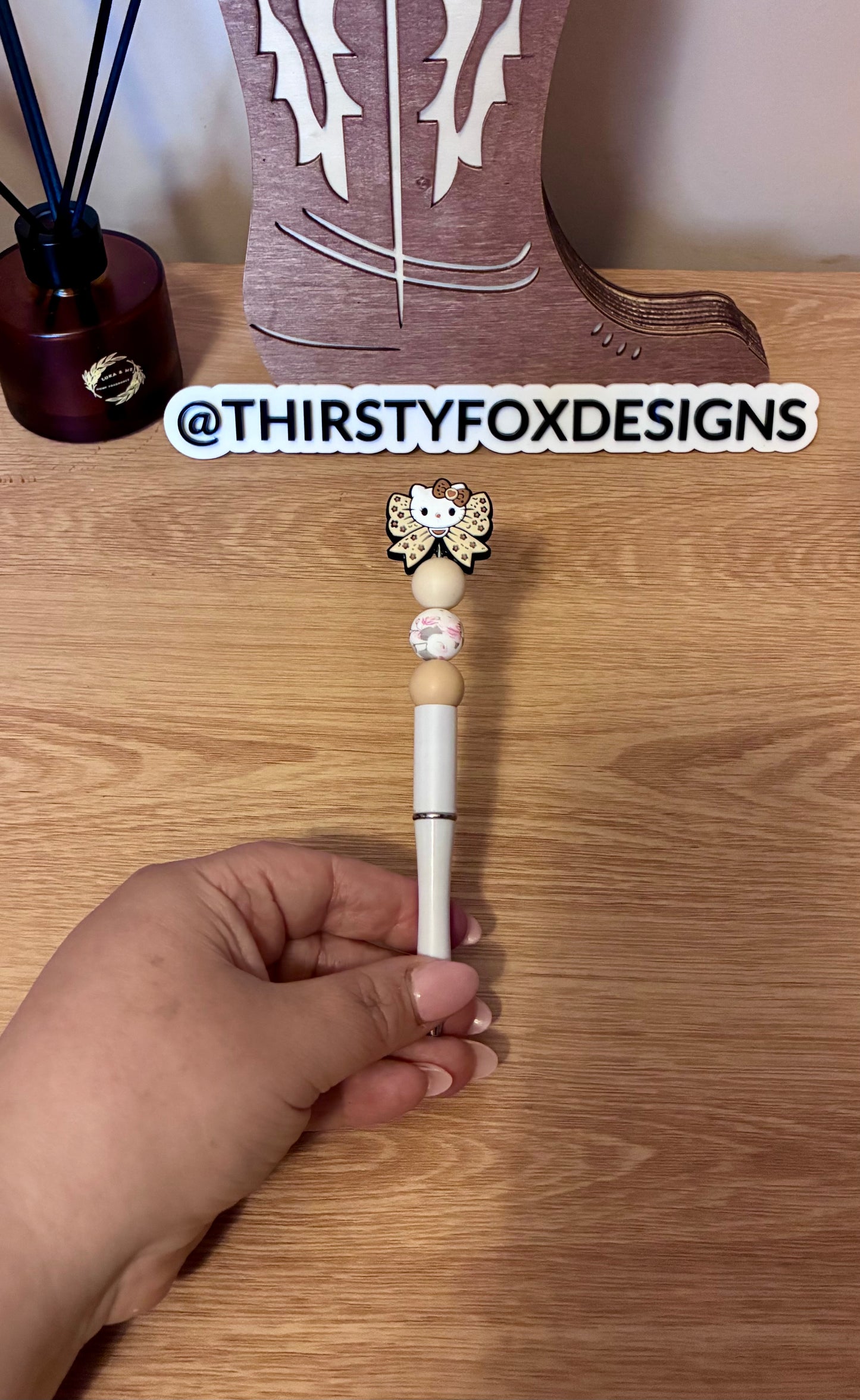 White & light brown hello kitty beaded pen