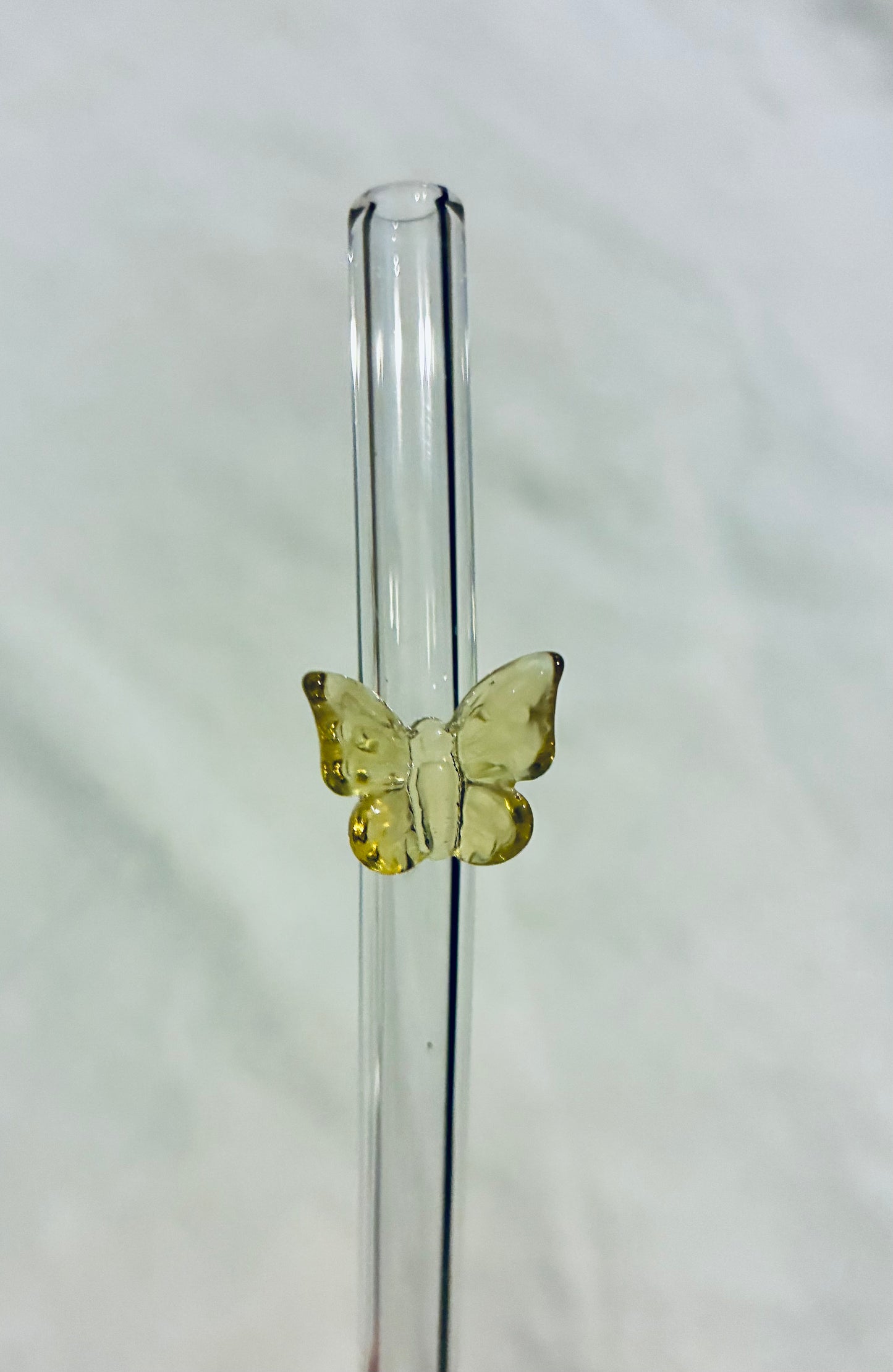 Yellow glass butterfly straw