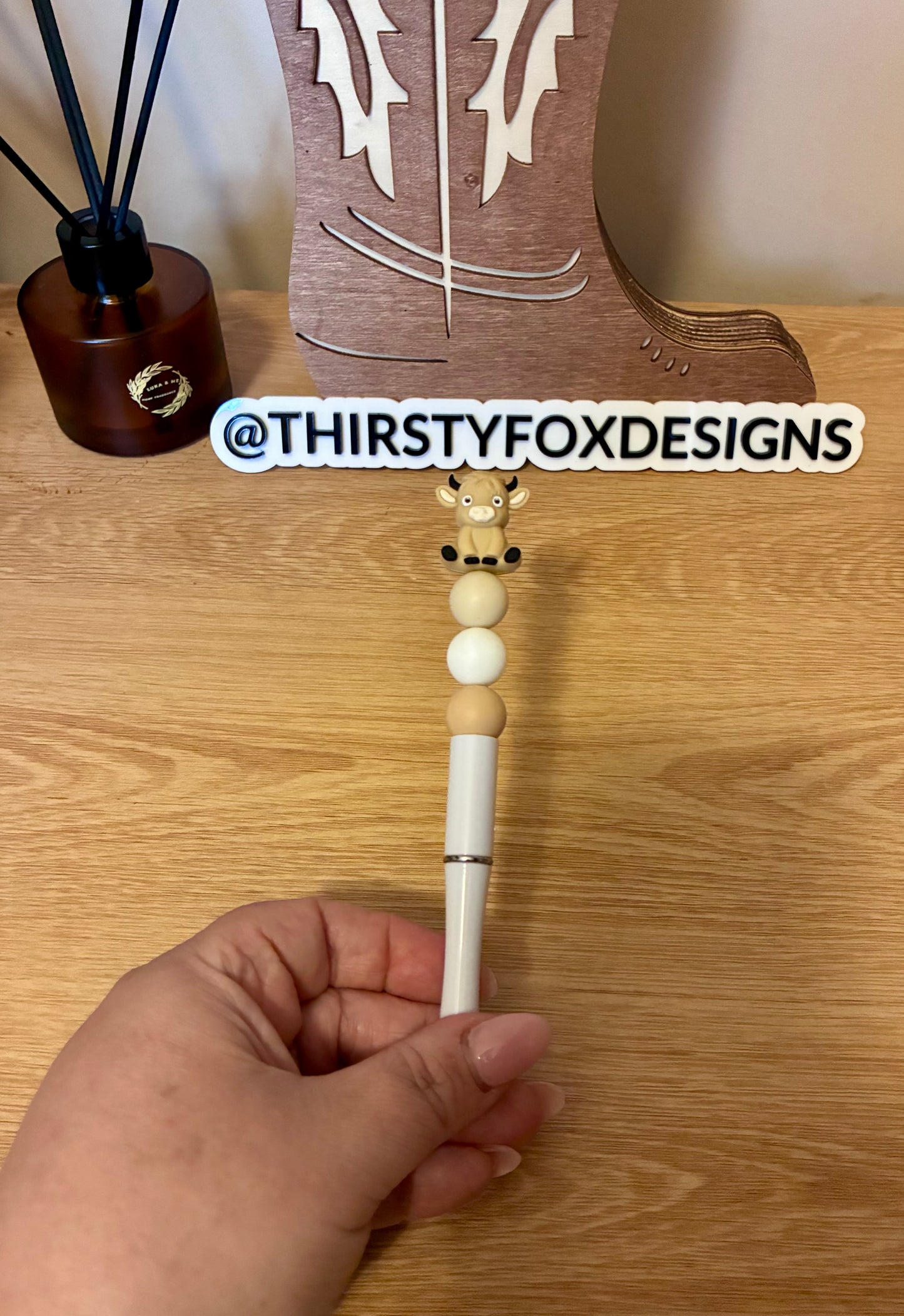 White & brown cow pen