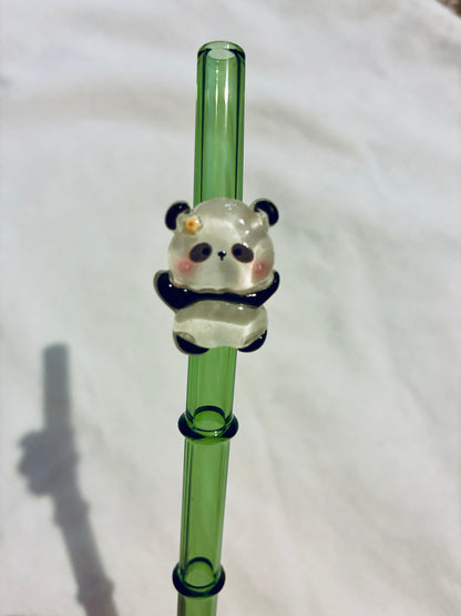 Glass panda on bamboo straw