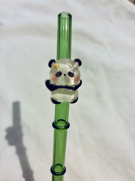 Glass panda on bamboo straw