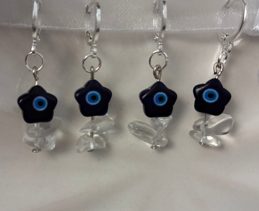 Evil eye flower huggie earrings