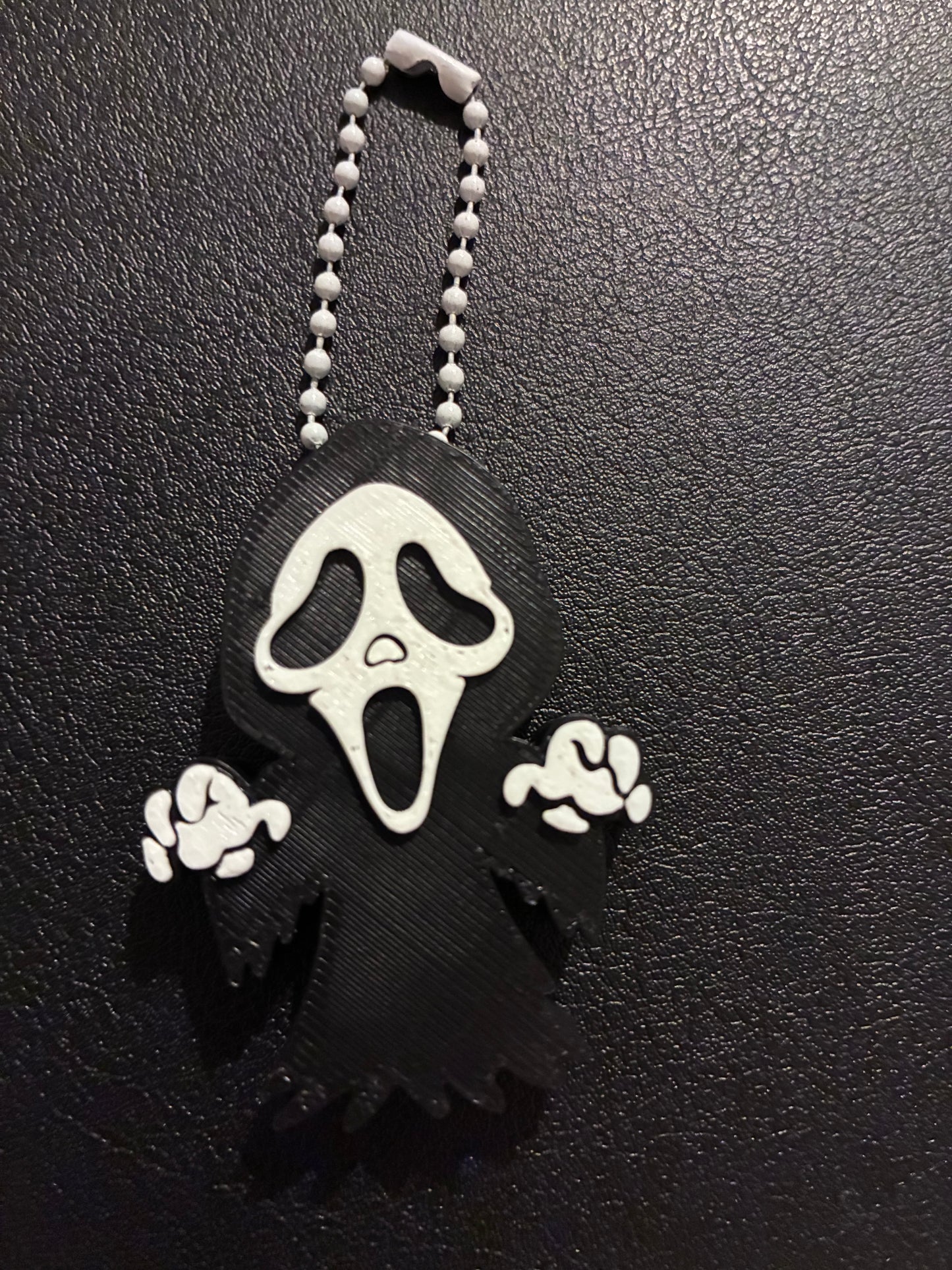 Black ghost face nail saver